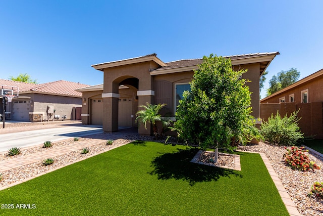 3081 E Desert Broom Pl, Chandler, AZ 85286 - view of front of house featuring driveway, stucco siding, and an attached garage