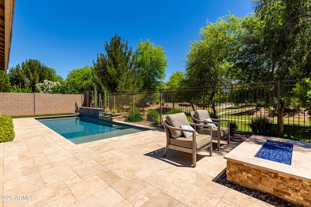 3081 E Desert Broom Pl, Chandler, AZ 85286 - view of pool with a patio, a fenced backyard, and an outdoor fire pit