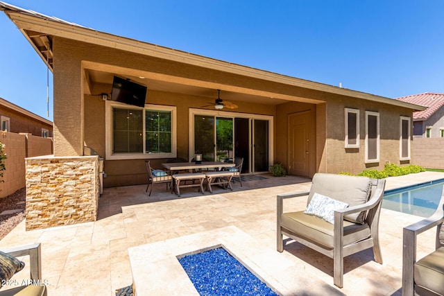 3081 E Desert Broom Pl, Chandler, AZ 85286 - view of patio featuring a fenced backyard, ceiling fan, outdoor dining area, and a fire pit