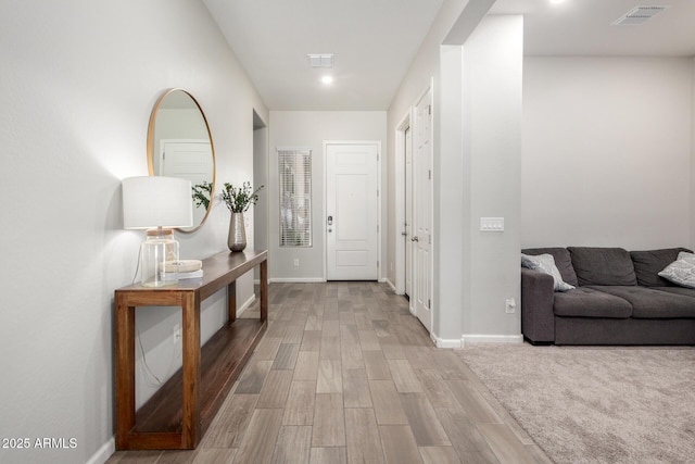 3081 E Desert Broom Pl, Chandler, AZ 85286 - entrance foyer featuring wood finished floors and baseboards