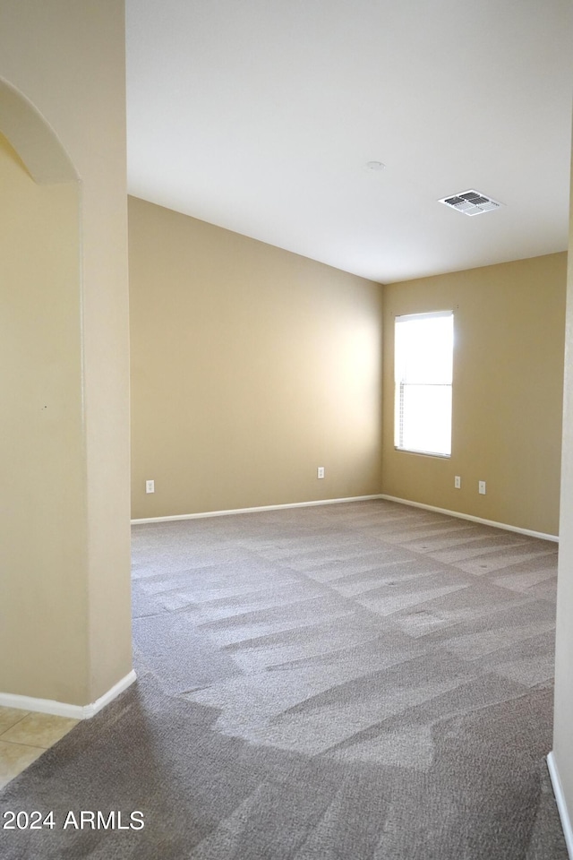 view of carpeted spare room