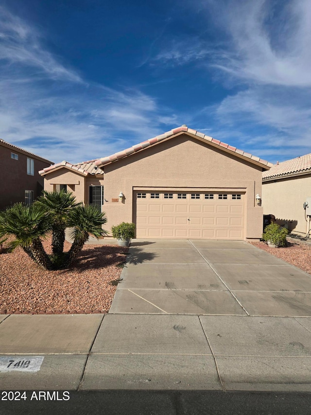 view of front of home with a garage