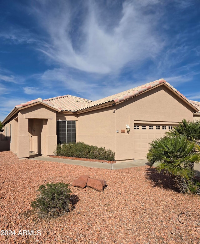 view of front of property featuring a garage