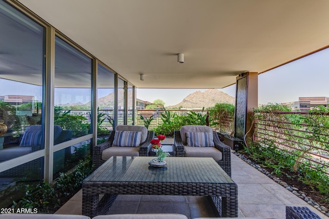 7161 E Rancho Vista Dr Unit 6001, Scottsdale, AZ 85251 - view of patio / terrace featuring a balcony, outdoor lounge area, and a mountain view