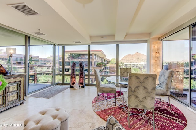 7161 E Rancho Vista Dr Unit 6001, Scottsdale, AZ 85251 - sunroom / solarium with a wall of windows and visible vents