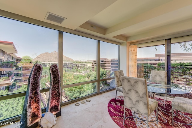 7161 E Rancho Vista Dr Unit 6001, Scottsdale, AZ 85251 - sunroom / solarium with a mountain view, visible vents, and plenty of natural light