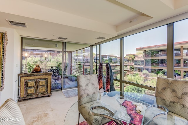 7161 E Rancho Vista Dr Unit 6001, Scottsdale, AZ 85251 - sunroom with visible vents and a healthy amount of sunlight