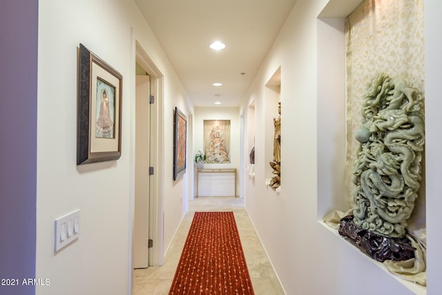 7161 E Rancho Vista Dr Unit 6001, Scottsdale, AZ 85251 - corridor with recessed lighting and light tile patterned flooring