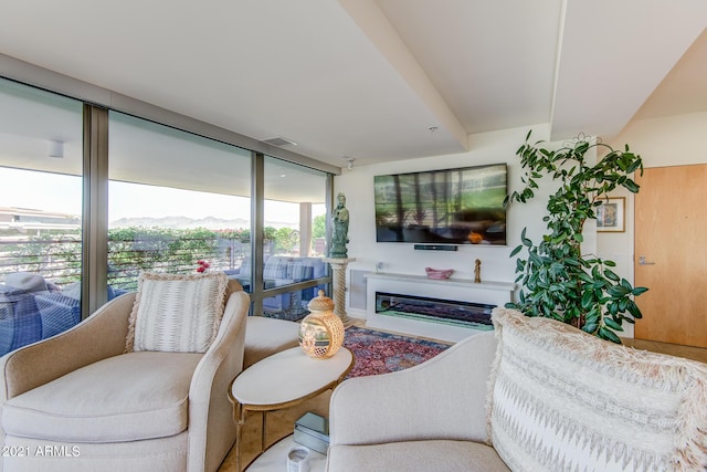 7161 E Rancho Vista Dr Unit 6001, Scottsdale, AZ 85251 - living room with visible vents and floor to ceiling windows