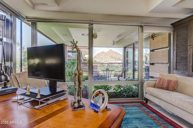 living room with ceiling fan