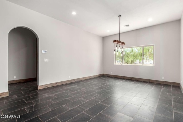 2009 S Raindance Rd, Apache Junction, AZ 85119 - spare room with arched walkways and recessed lighting