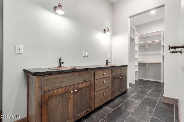 2009 S Raindance Rd, Apache Junction, AZ 85119 - bathroom featuring double vanity and a spacious closet
