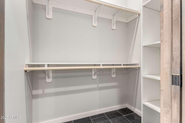 2009 S Raindance Rd, Apache Junction, AZ 85119 - spacious closet with dark tile patterned flooring