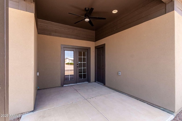2009 S Raindance Rd, Apache Junction, AZ 85119 - doorway to property featuring a ceiling fan, stucco siding, a patio area, and french doors