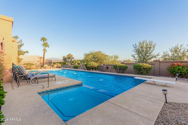 18649 E Mcdowell Mountain Dr, Rio Verde, AZ 85263 - view of swimming pool with a fenced in pool, a diving board, a fenced backyard, and a patio area