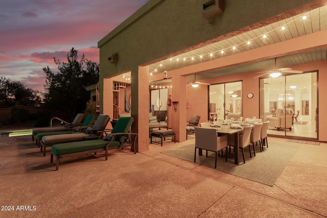 18649 E Mcdowell Mountain Dr, Rio Verde, AZ 85263 - patio terrace at dusk with outdoor dining space
