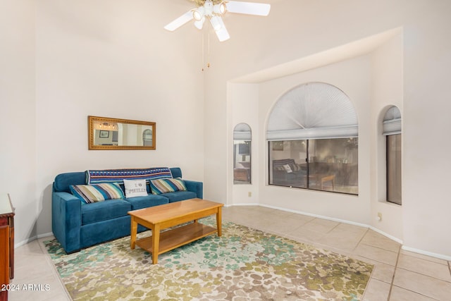 18649 E Mcdowell Mountain Dr, Rio Verde, AZ 85263 - living room with tile patterned floors, ceiling fan, baseboards, and a high ceiling