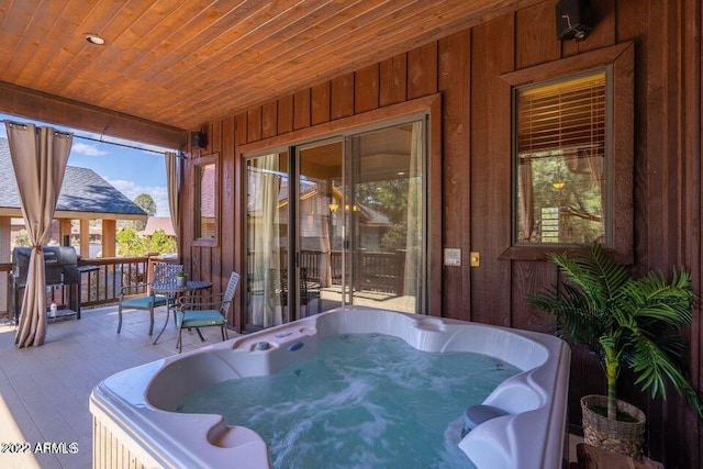 view of patio with a hot tub