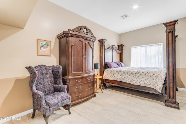 bedroom with decorative columns