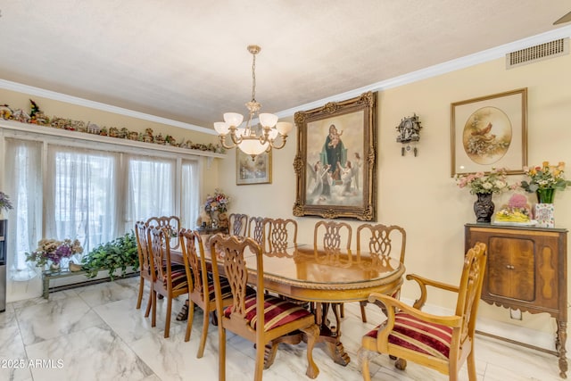 dining area featuring crown molding and an inviting chandelier