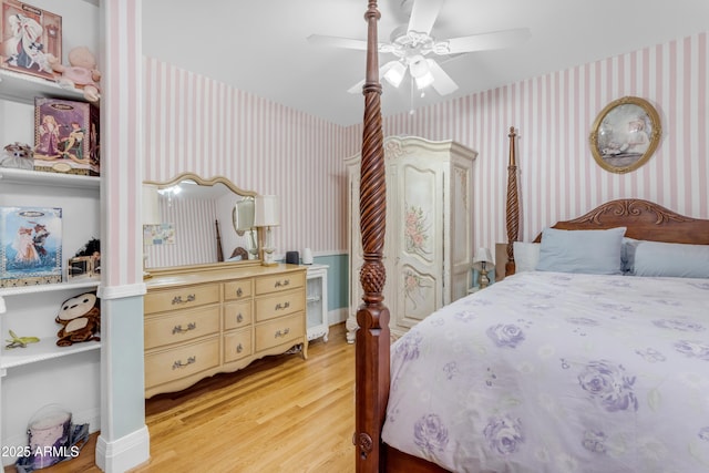 bedroom featuring ceiling fan and hardwood / wood-style floors