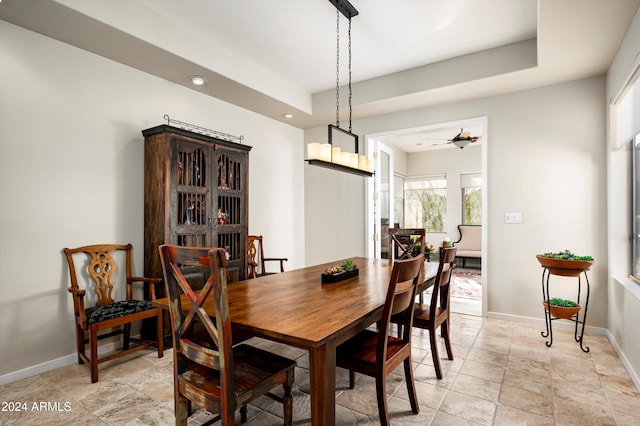 dining area with ceiling fan