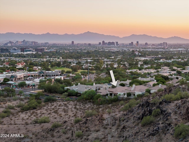 aerial view at dusk with a mountain view