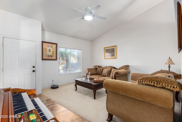 carpeted living room with vaulted ceiling and ceiling fan