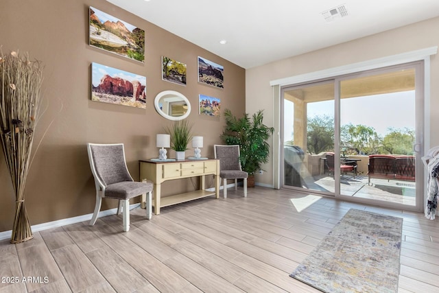 living area with light wood-type flooring