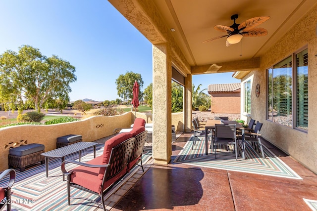 view of patio / terrace with outdoor lounge area and ceiling fan