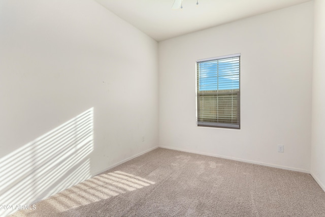 spare room with carpet flooring