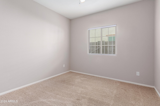 empty room with carpet flooring