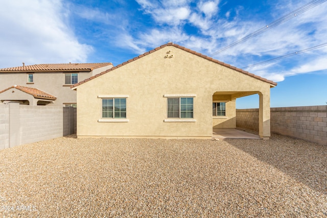 rear view of house with a patio area