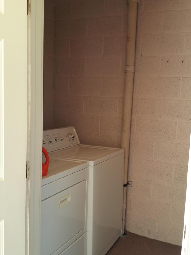 washroom featuring separate washer and dryer