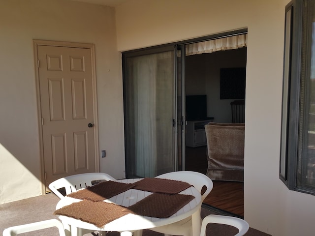 dining space featuring hardwood / wood-style floors