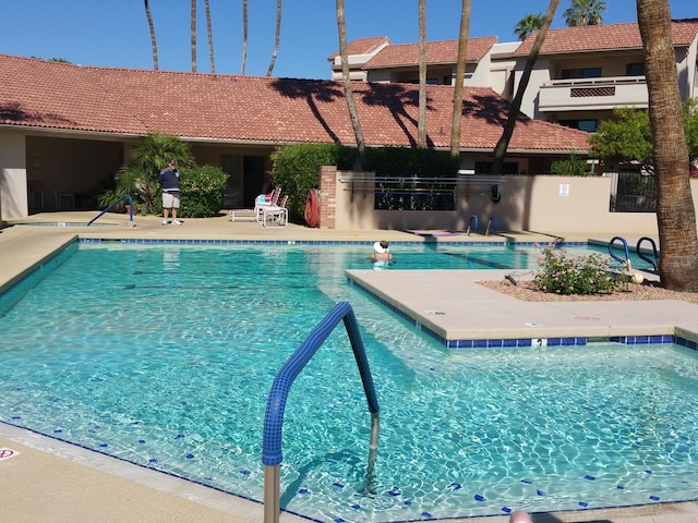 view of pool featuring a patio area