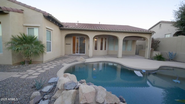 view of swimming pool with a patio area