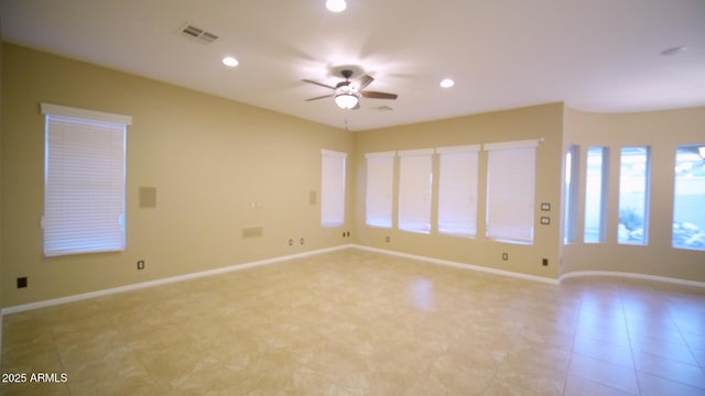 spare room featuring ceiling fan