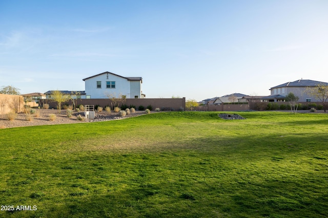 view of yard with fence