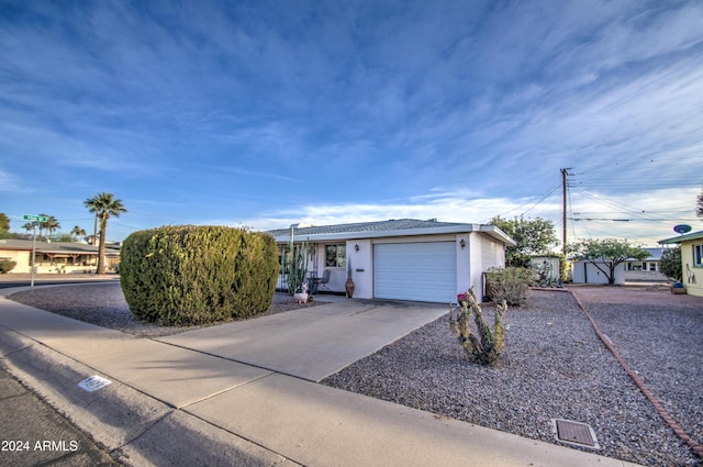 view of front of home with a garage