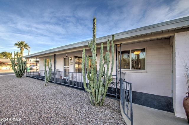 view of front of property featuring covered porch