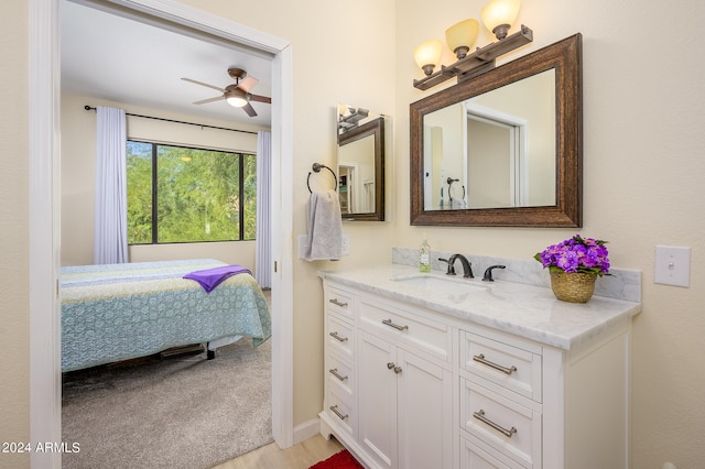 bathroom with vanity and ceiling fan