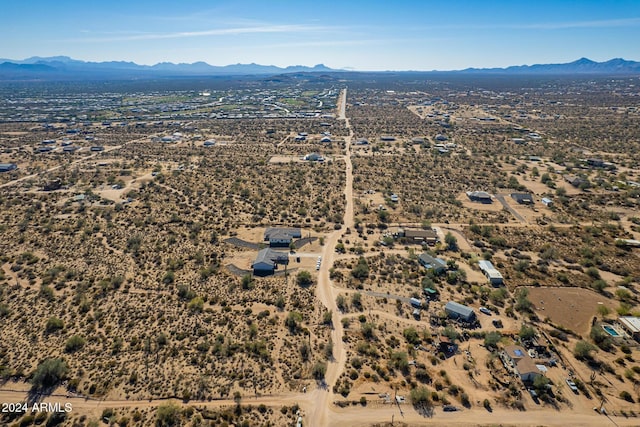 drone / aerial view featuring a mountain view