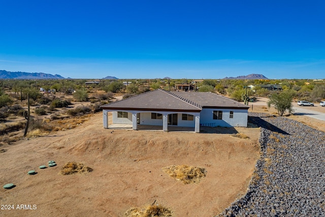 view of front of house with a mountain view