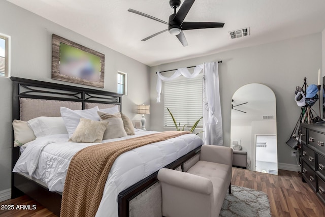 1324 S Banning St, Gilbert, AZ 85296 - bedroom with wood finished floors, baseboards, and a ceiling fan