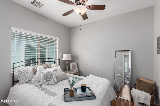 1324 S Banning St, Gilbert, AZ 85296 - bedroom featuring wood finished floors and a ceiling fan