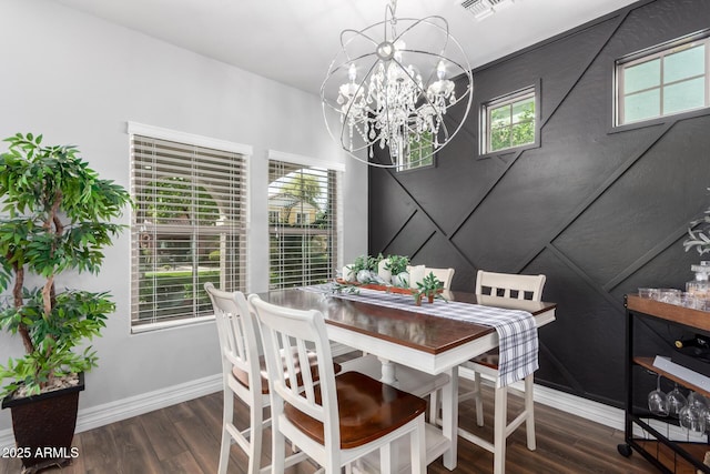1324 S Banning St, Gilbert, AZ 85296 - dining space with wood finished floors, healthy amount of natural light, baseboards, and a chandelier