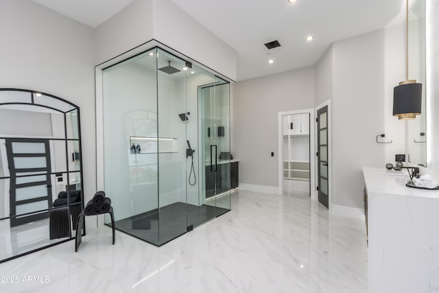 full bath with visible vents, marble finish floor, vanity, a shower stall, and recessed lighting