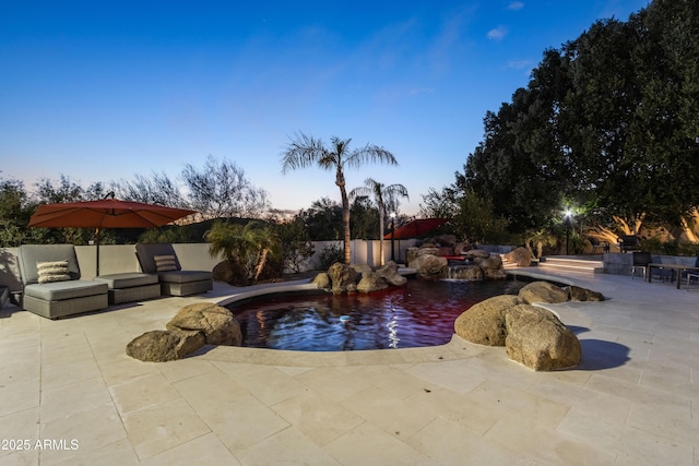 view of pool with a patio area, a fenced backyard, and a fenced in pool