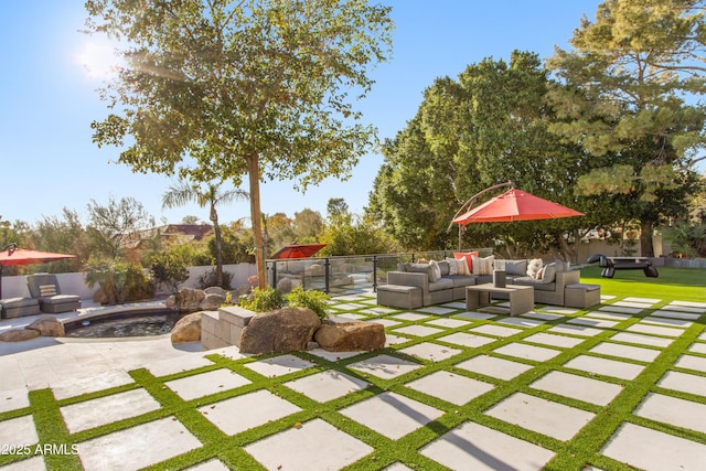 view of patio / terrace with outdoor lounge area and a fenced backyard